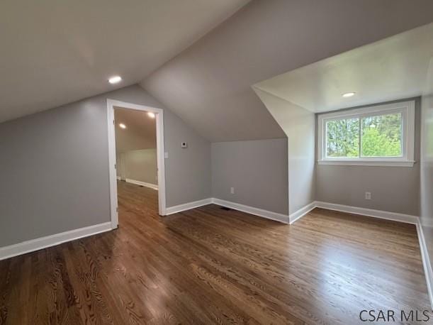 2200 Dundee Ln, Johnstown, PA 15905 - bonus room with wood finished floors, vaulted ceiling, and baseboards