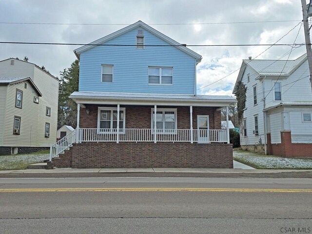 17 Grant St, Salisbury, PA 15558 - view of front facade with a porch and brick siding