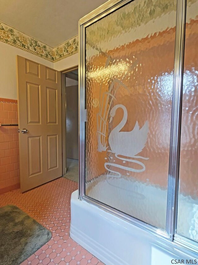 17 Grant St, Salisbury, PA 15558 - full bath featuring tile walls, tile patterned flooring, a shower with door, and a wainscoted wall