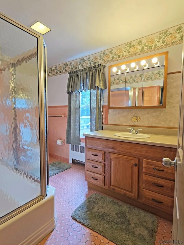 17 Grant St, Salisbury, PA 15558 - bathroom with a shower with shower door, radiator heating unit, and vanity