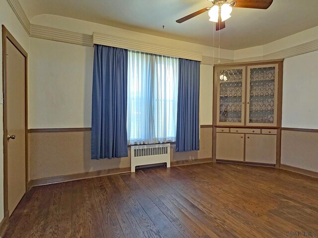 17 Grant St, Salisbury, PA 15558 - unfurnished room with radiator heating unit, hardwood / wood-style floors, and ceiling fan