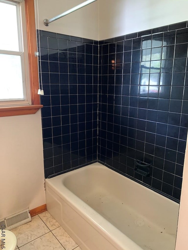 bathroom featuring tile patterned floors and shower / bathing tub combination