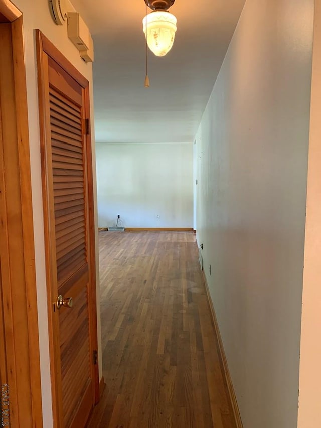 hall featuring dark hardwood / wood-style floors