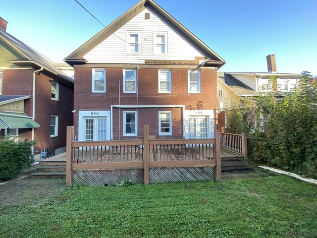 856-858 Ferndale Ave, Johnstown, PA 15905 - rear view of property with a wooden deck and a lawn