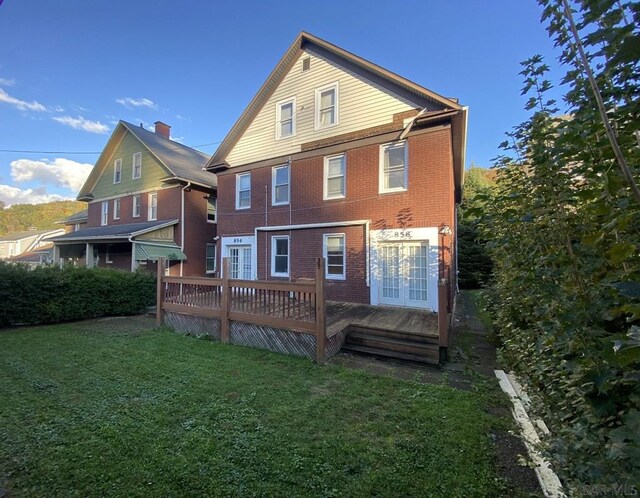 856-858 Ferndale Ave, Johnstown, PA 15905 - back of property with a yard, french doors, and a deck