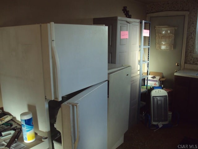 kitchen featuring white fridge