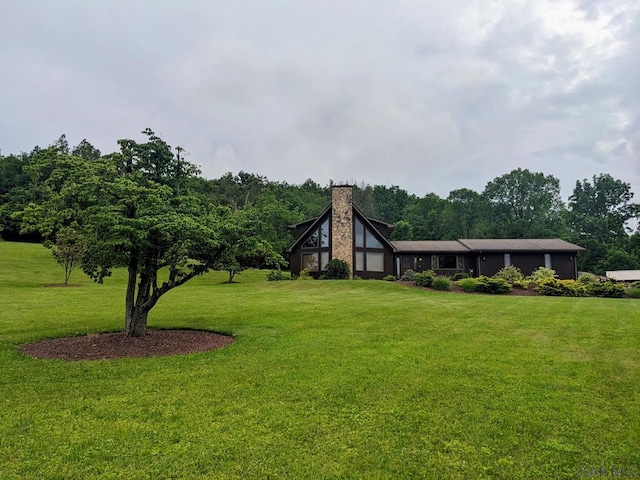 350 American Legion Rd, Latrobe, PA 15650 - view of front of property featuring a front lawn and a chimney
