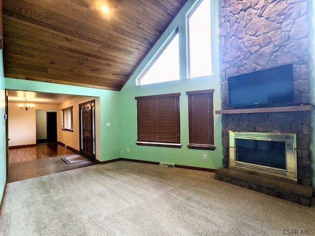 350 American Legion Rd, Latrobe, PA 15650 - unfurnished living room with carpet floors, wooden ceiling, a fireplace, high vaulted ceiling, and a chandelier