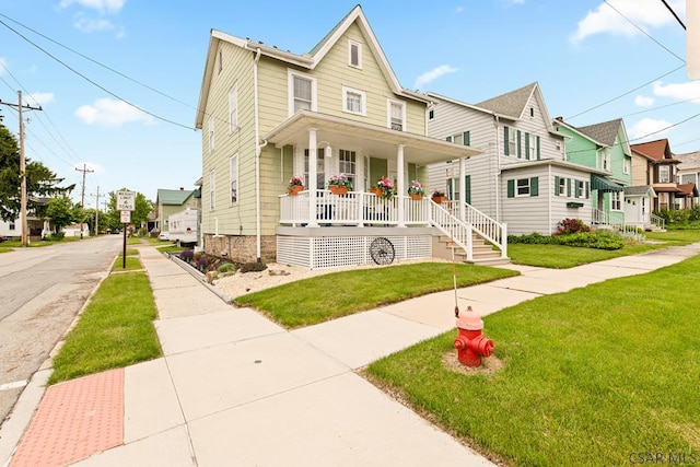 540 S Center Ave, Somerset, PA 15501 - view of front of home featuring covered porch, a front yard, and a residential view