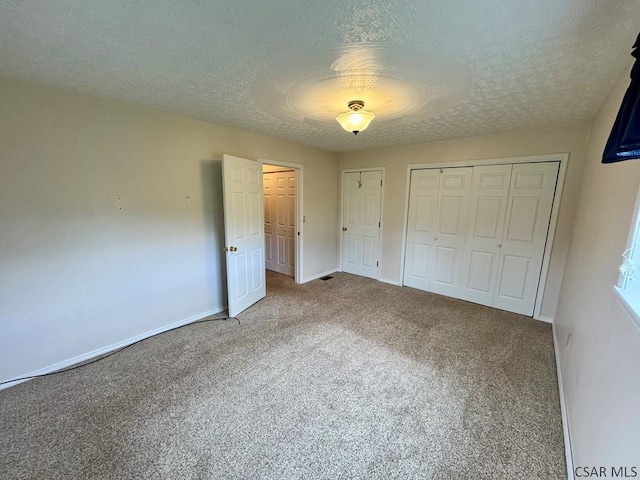152 Aviator Ln, Friedens, PA 15541 - unfurnished bedroom featuring carpet, a textured ceiling, and a closet