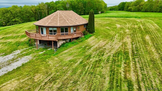 152 Aviator Ln, Friedens, PA 15541 - back of house with a deck, a lawn, a view of trees, and driveway