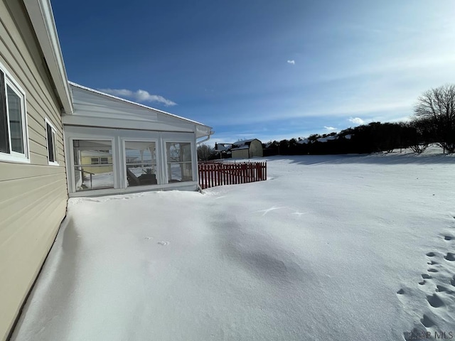 view of snow covered patio