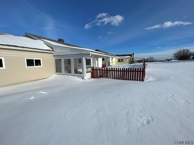 view of snow covered property