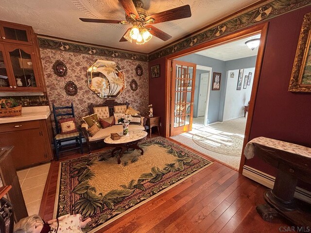 1040 Causeway Dr, Friedens, PA 15541 - living area with visible vents, a ceiling fan, hardwood / wood-style flooring, and wallpapered walls