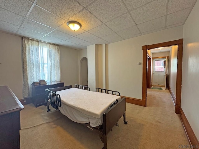 R1249 Main St, Johnstown, PA 15909 - bedroom with arched walkways, light colored carpet, and a paneled ceiling