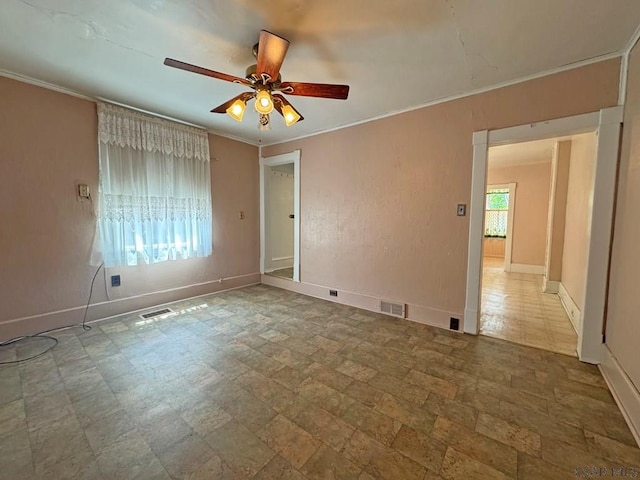 R1249 Main St, Johnstown, PA 15909 - empty room featuring a ceiling fan and crown molding