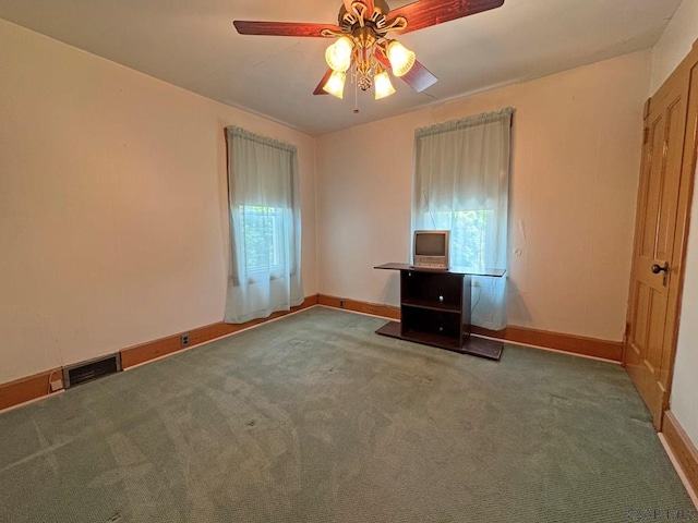 R1249 Main St, Johnstown, PA 15909 - unfurnished bedroom featuring carpet and ceiling fan