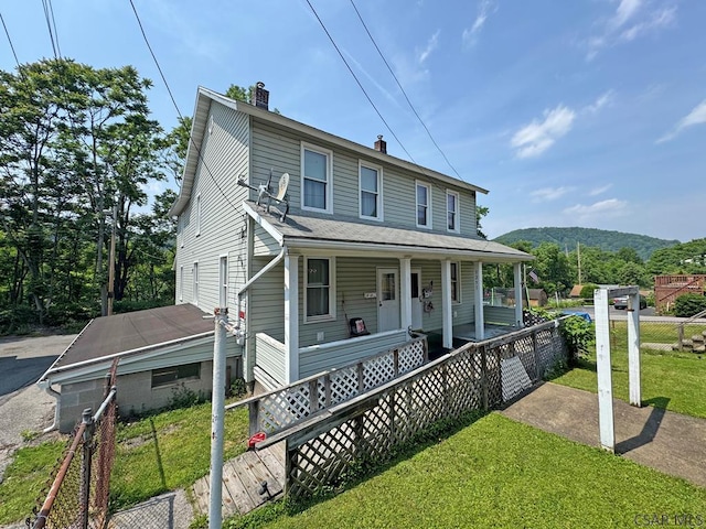 R1249 Main St, Johnstown, PA 15909 - view of front of property with a chimney and a porch