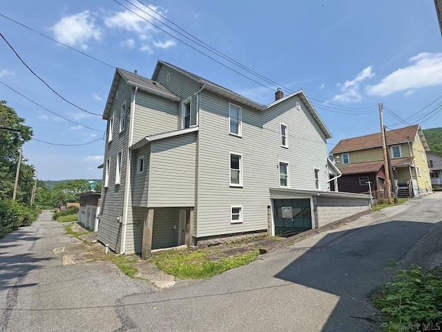 R1249 Main St, Johnstown, PA 15909 - view of property exterior with a chimney