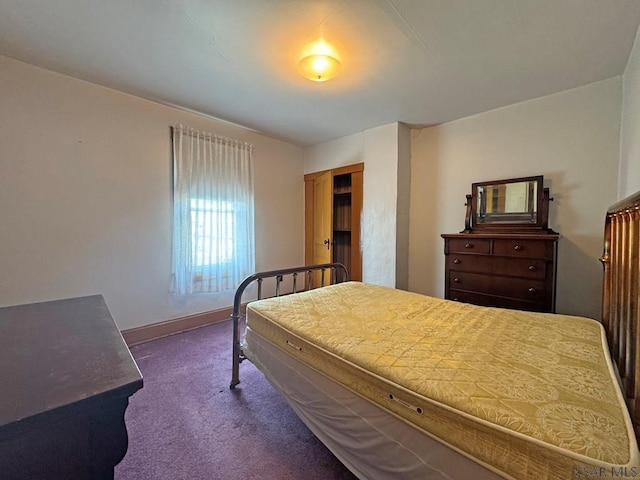R1249 Main St, Johnstown, PA 15909 - bedroom with dark carpet and baseboards