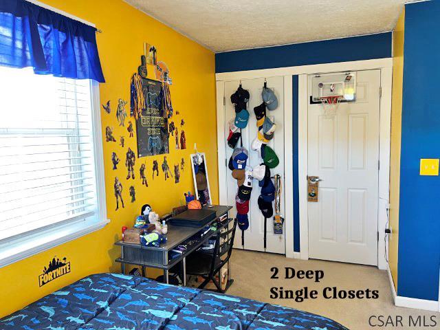 bedroom featuring a textured ceiling