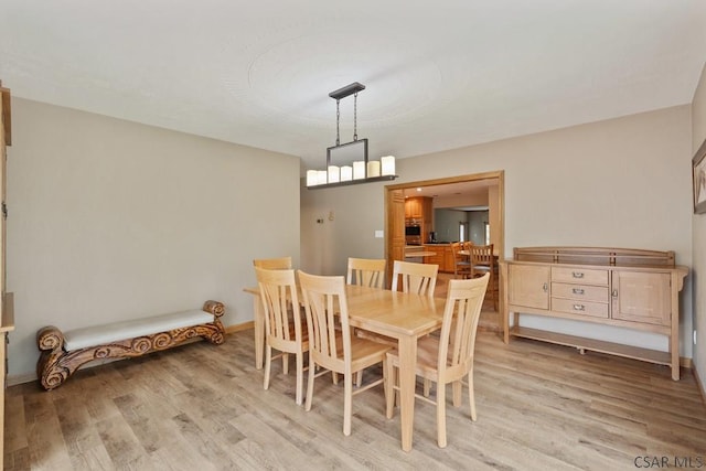 373 Hillside Ln, Somerset, PA 15501 - dining room featuring light wood-style flooring and baseboards