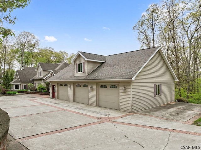 373 Hillside Ln, Somerset, PA 15501 - view of side of home featuring roof with shingles and driveway