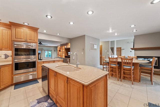 373 Hillside Ln, Somerset, PA 15501 - kitchen featuring a sink, a warming drawer, stainless steel appliances, a center island with sink, and recessed lighting