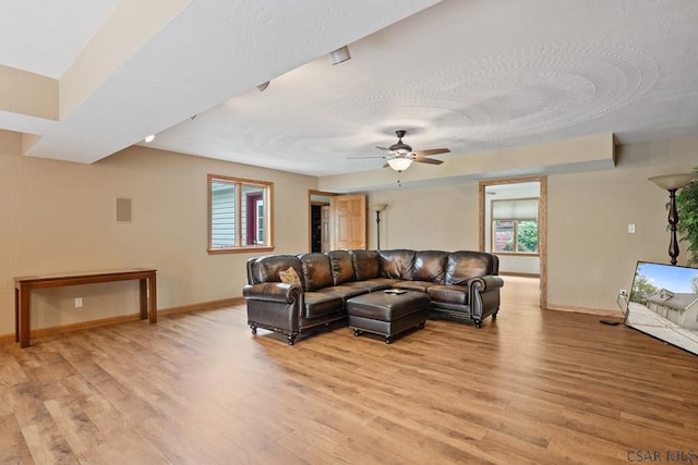 373 Hillside Ln, Somerset, PA 15501 - living room with baseboards, light wood-style floors, ceiling fan, and a textured ceiling