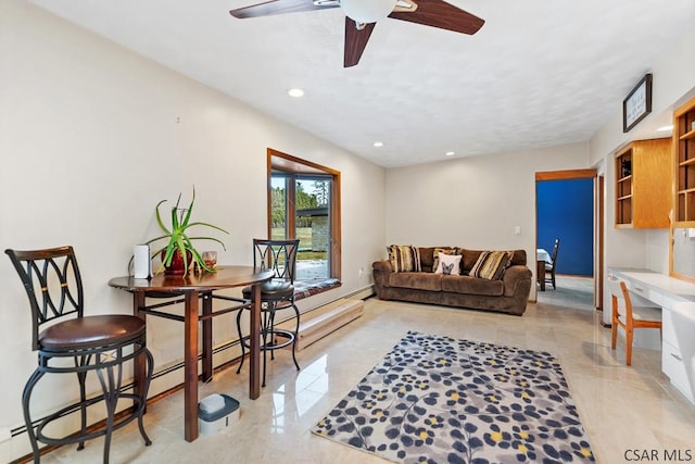 living room featuring recessed lighting, baseboards, and a ceiling fan