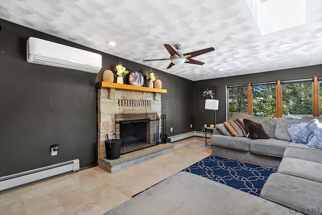 living area with a ceiling fan, baseboards, a wall mounted AC, a fireplace, and baseboard heating