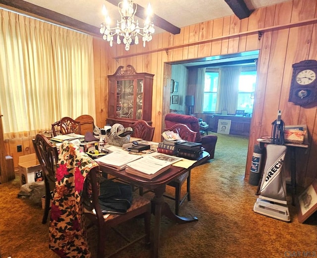 123 Venango St, Johnstown, PA 15905 - dining room with carpet floors, a chandelier, wood walls, and beamed ceiling
