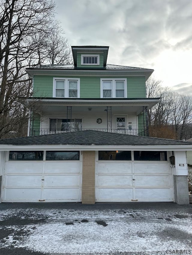 view of property featuring a garage