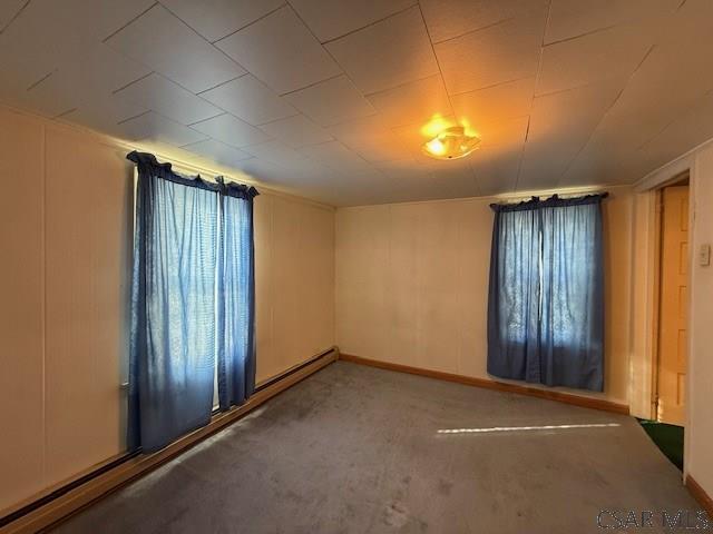 201 7th St, Windber, PA 15963 - empty room with carpet floors and baseboards