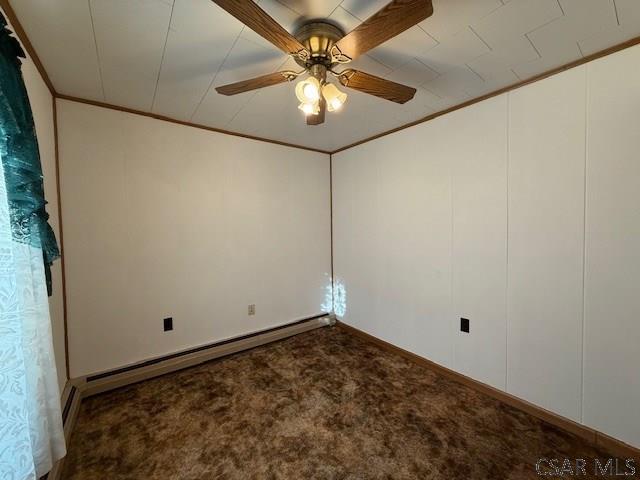 201 7th St, Windber, PA 15963 - carpeted empty room featuring crown molding, ceiling fan, a baseboard radiator, and baseboards