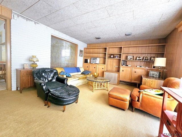 living room featuring light colored carpet and visible vents