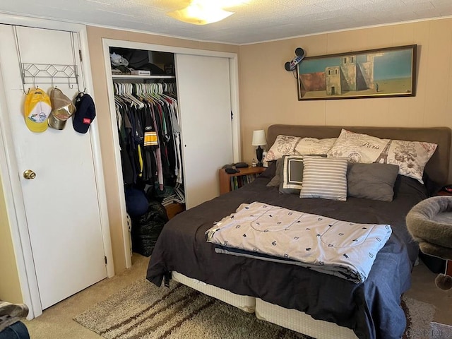 carpeted bedroom with a closet