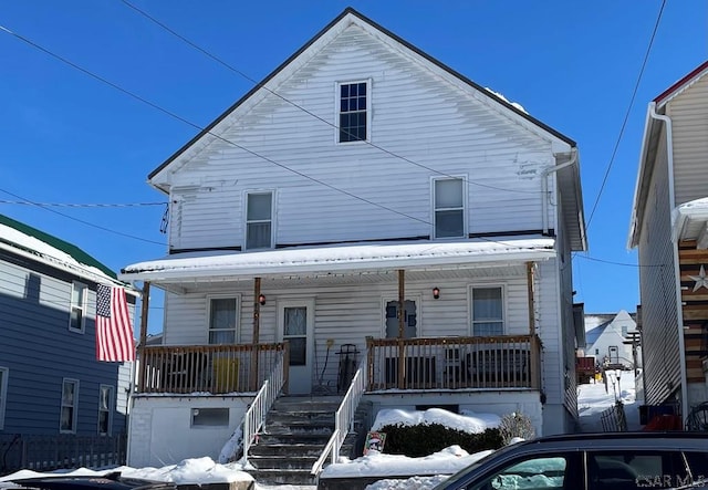 view of property with covered porch