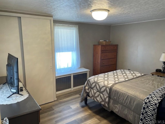 bedroom featuring hardwood / wood-style flooring