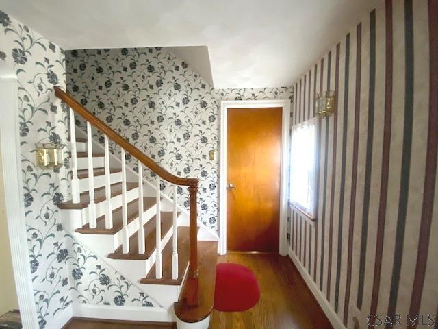 entrance foyer featuring hardwood / wood-style floors