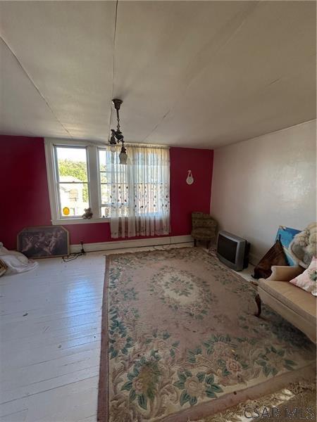 interior space with hardwood / wood-style flooring