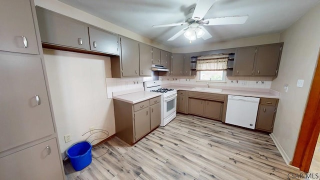 1210 Somerset Ave, Windber, PA 15963 - kitchen featuring white appliances, a sink, decorative backsplash, and open shelves