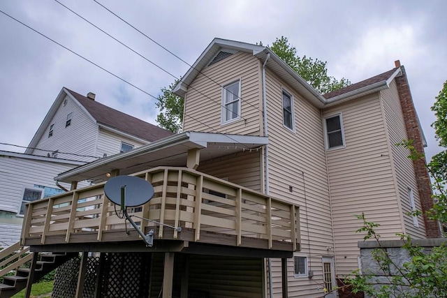 1210 Somerset Ave, Windber, PA 15963 - back of property with a wooden deck and stairs