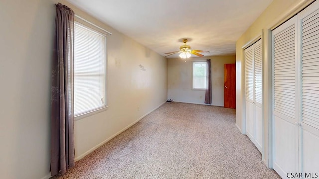1210 Somerset Ave, Windber, PA 15963 - carpeted empty room featuring ceiling fan and baseboards