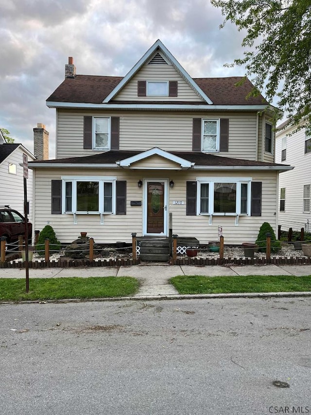 1210 Somerset Ave, Windber, PA 15963 - view of front of property featuring entry steps and a chimney