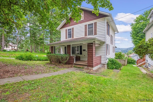 769 Russell Ave, Johnstown, PA 15902 - view of front of home with covered porch and a front yard