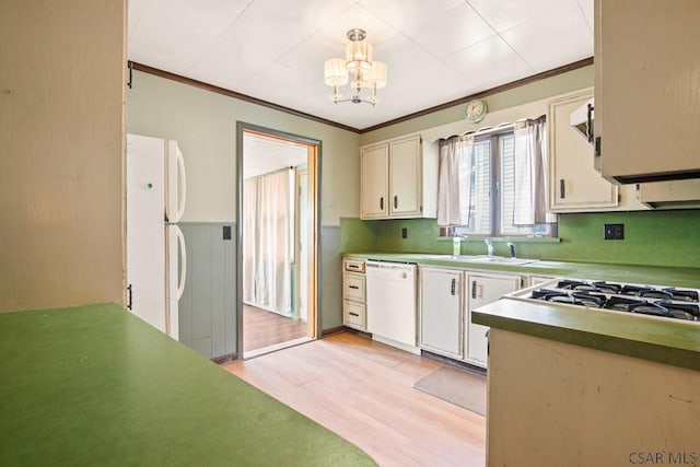 769 Russell Ave, Johnstown, PA 15902 - kitchen featuring white appliances, ornamental molding, a chandelier, light wood finished floors, and wainscoting