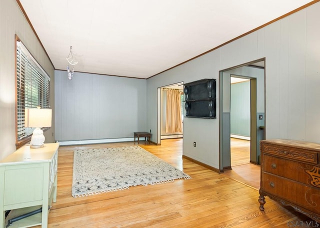 769 Russell Ave, Johnstown, PA 15902 - interior space with light wood-style flooring, a baseboard heating unit, a baseboard radiator, and ornamental molding