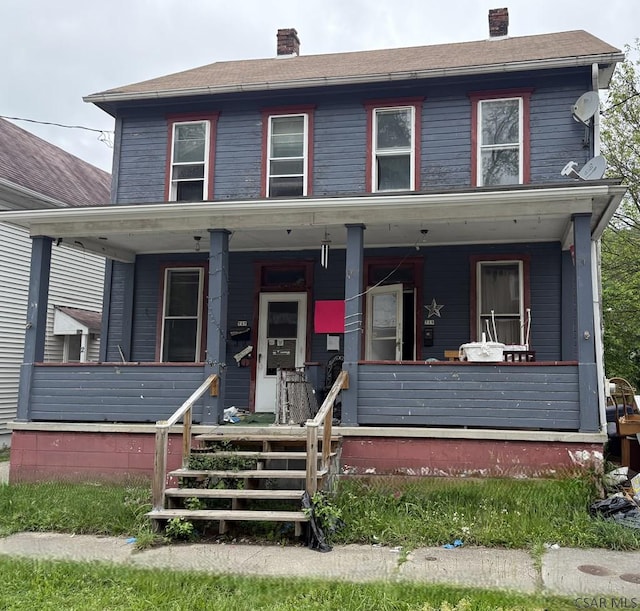 717-719 Messenger St, Johnstown, PA 15902 - american foursquare style home featuring a chimney and a porch