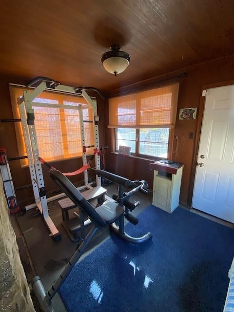 exercise room with wooden ceiling